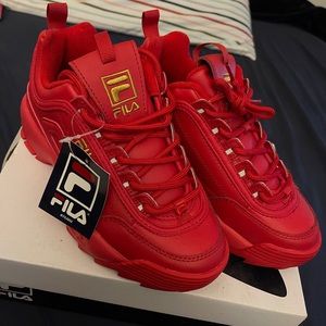 All red Fila’s - Kids size 5